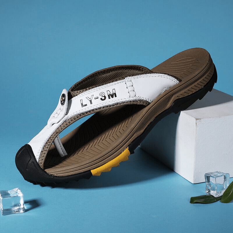 Casual men's genuine leather anti-slip flip-flops SF1068 on display with blue background, showcasing durable design and stylish look.